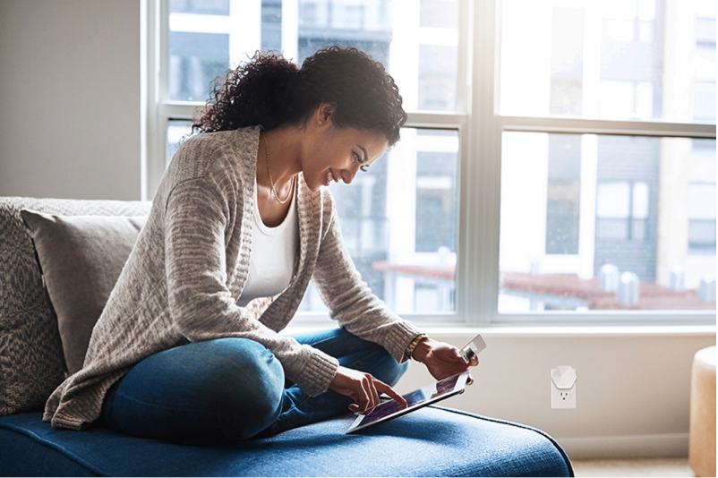 Happy lady using tablet