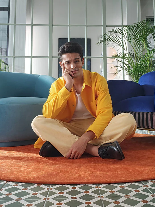 Individuals sit in different poses at different angles to take a selfie. With FlexCam, they can pose from a
				distance without holding the phone.