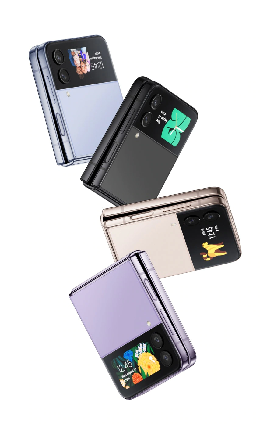 Four GalaxyZFlip4 phones, all folded and seen from an angle that shows the side and Front Cover. Blue, Graphite,
    Pink Gold, and Bora Purple colours are each represented. Each Cover Screen shows a different way to customize the
    clock face.