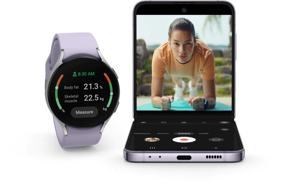 Galaxy Z Flip4 in FlexCam mode recording a workout video. Next to it is a Galaxy Watch5.