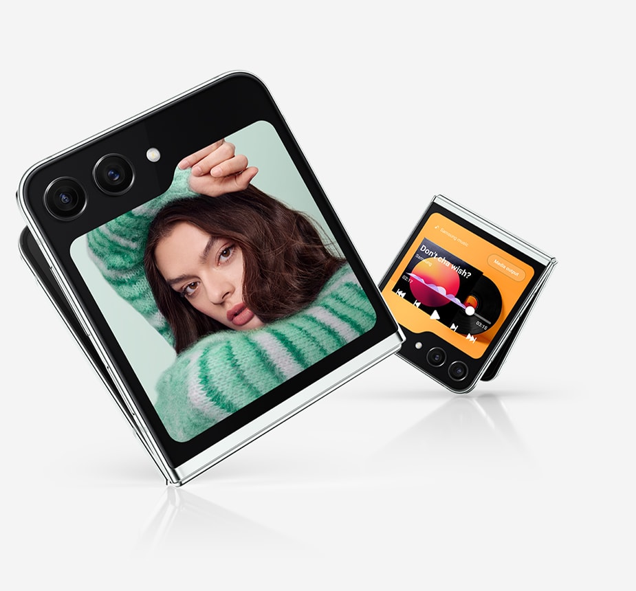 Two Galaxy Z Flip5 devices are slightly unfolded and seen from the Flex Window. One shows a selfie. The second shows a media player with playback controls and a progress bar