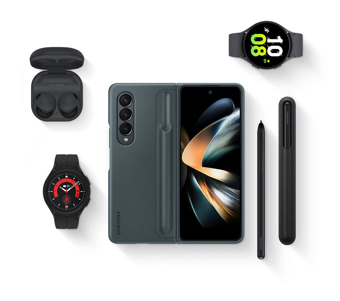 An overhead angle of Galaxy Buds2 Pro with the cradle open and the earbuds in place. Galaxy Watch5 with a
				graphic watch face. A Galaxy Z Fold4 with a Standing Cover with Pen installed and an S Pen Fold Edition and an S Pen
				Pro at its side. A Galaxy Watch5 Pro with a graphic watch face.